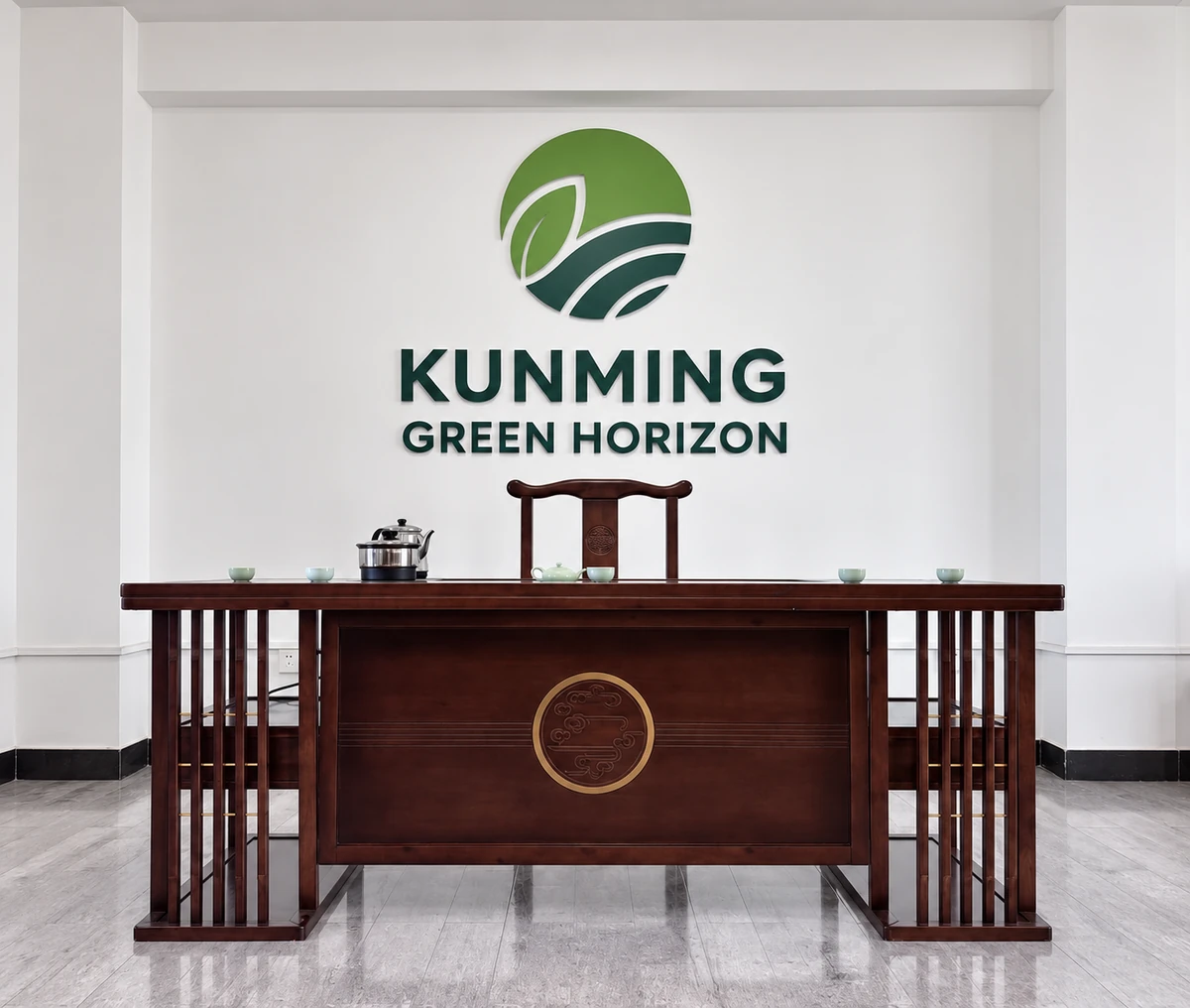 The KGH office in Kunming, with its level wooden tea table and company signage